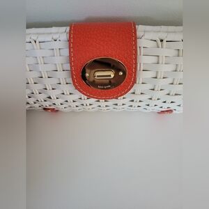 Kate Spade white woven clutch.